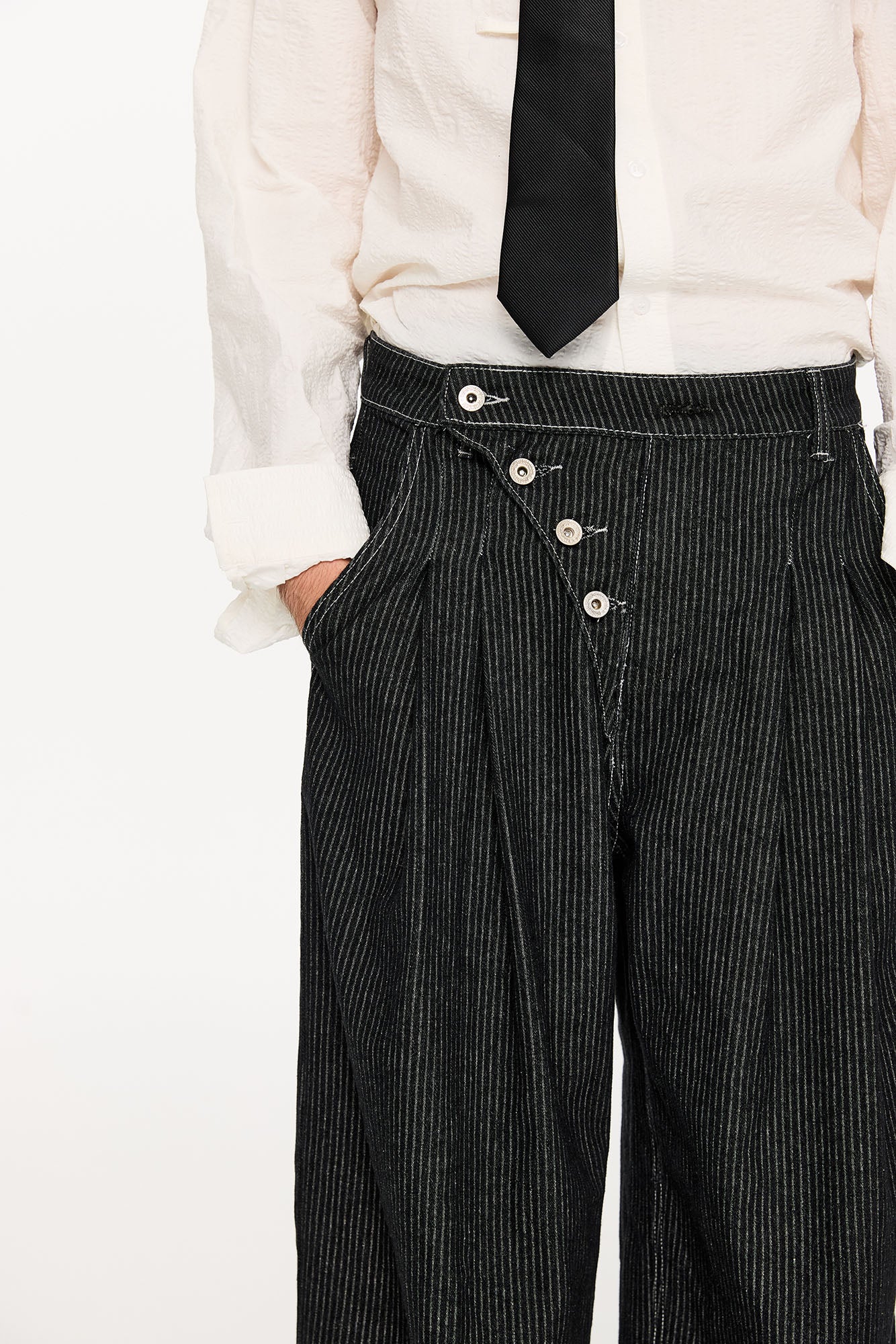 KREATE Asymmetric Button-Up Pleated Jeans