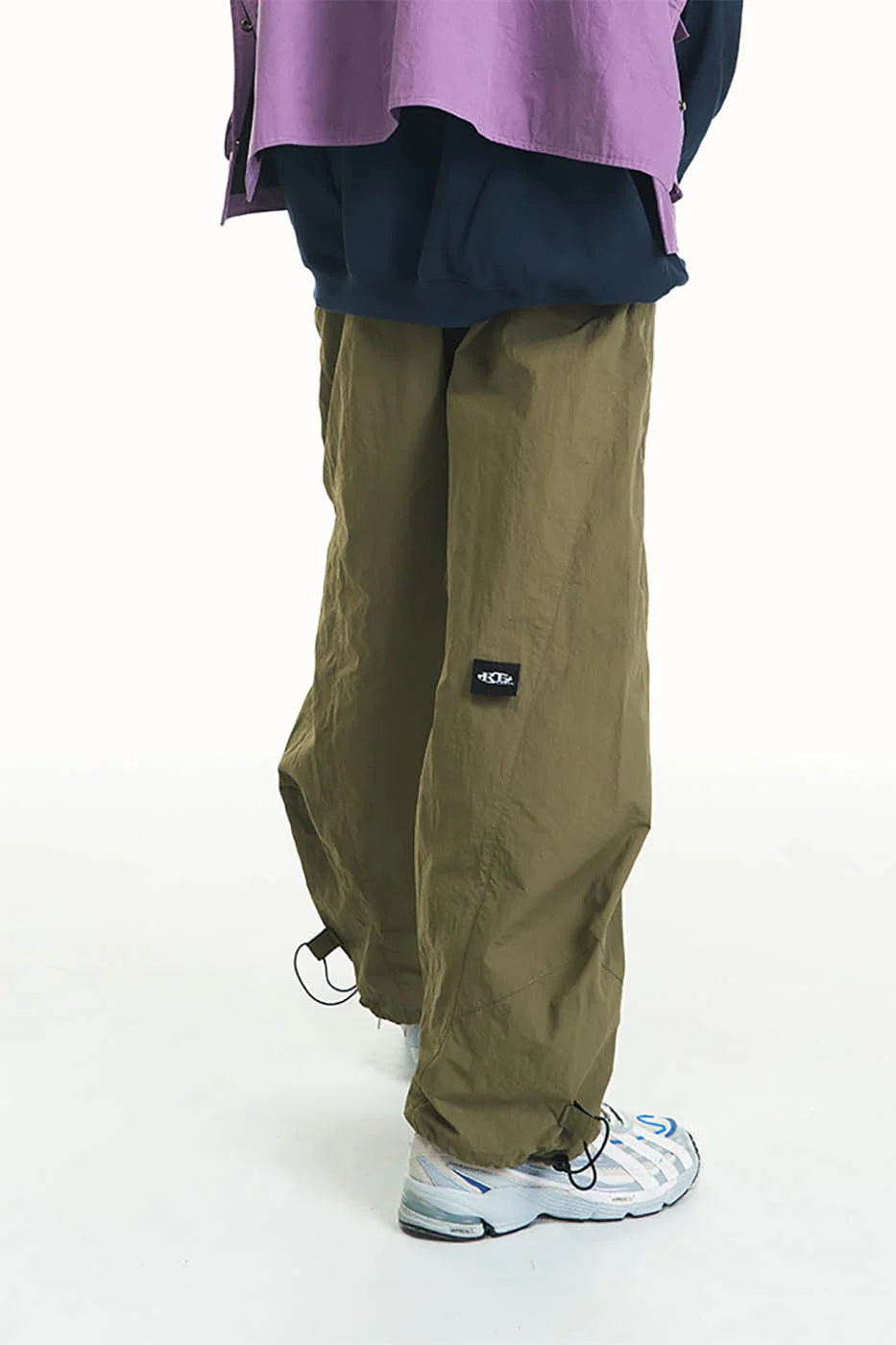 RELABEL Pleated Spliced Parachute Pants