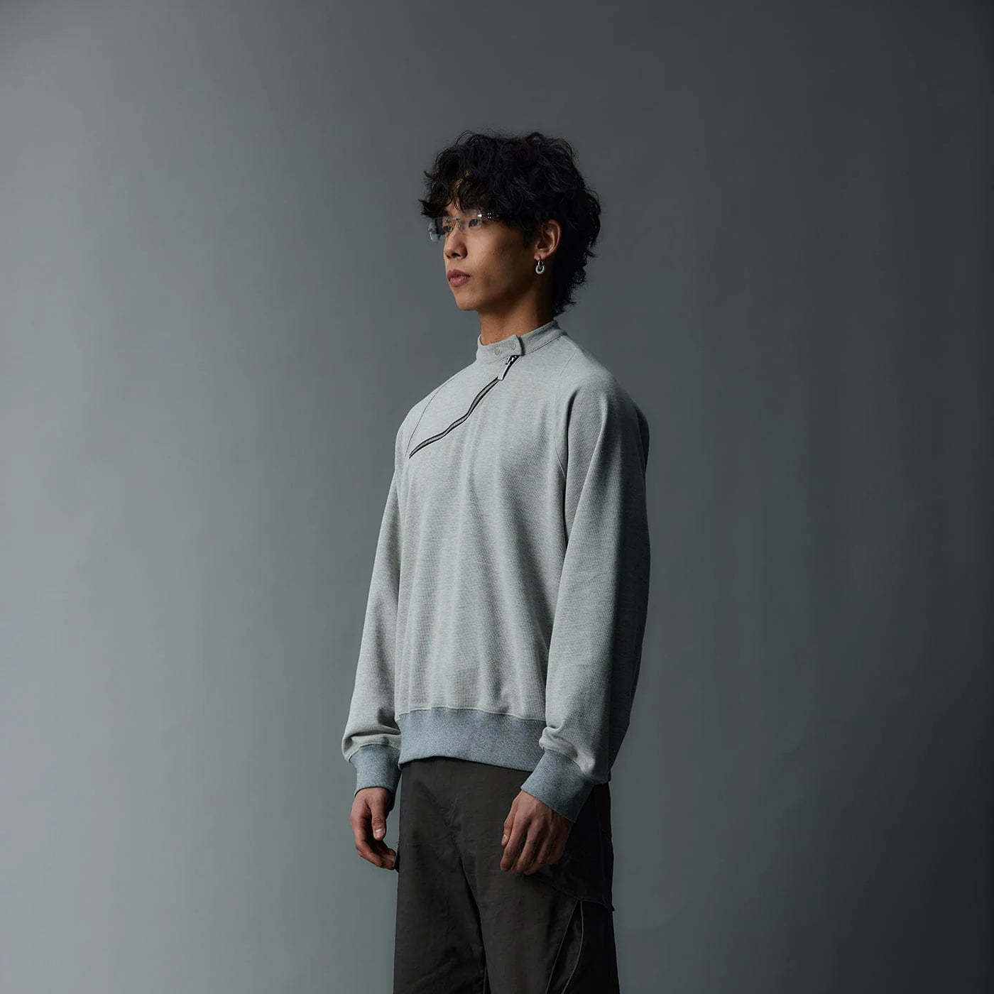 WHISTLEHUNTER Asymmetrical Zipper Rivet Mock Neck Light Sweatshirt
