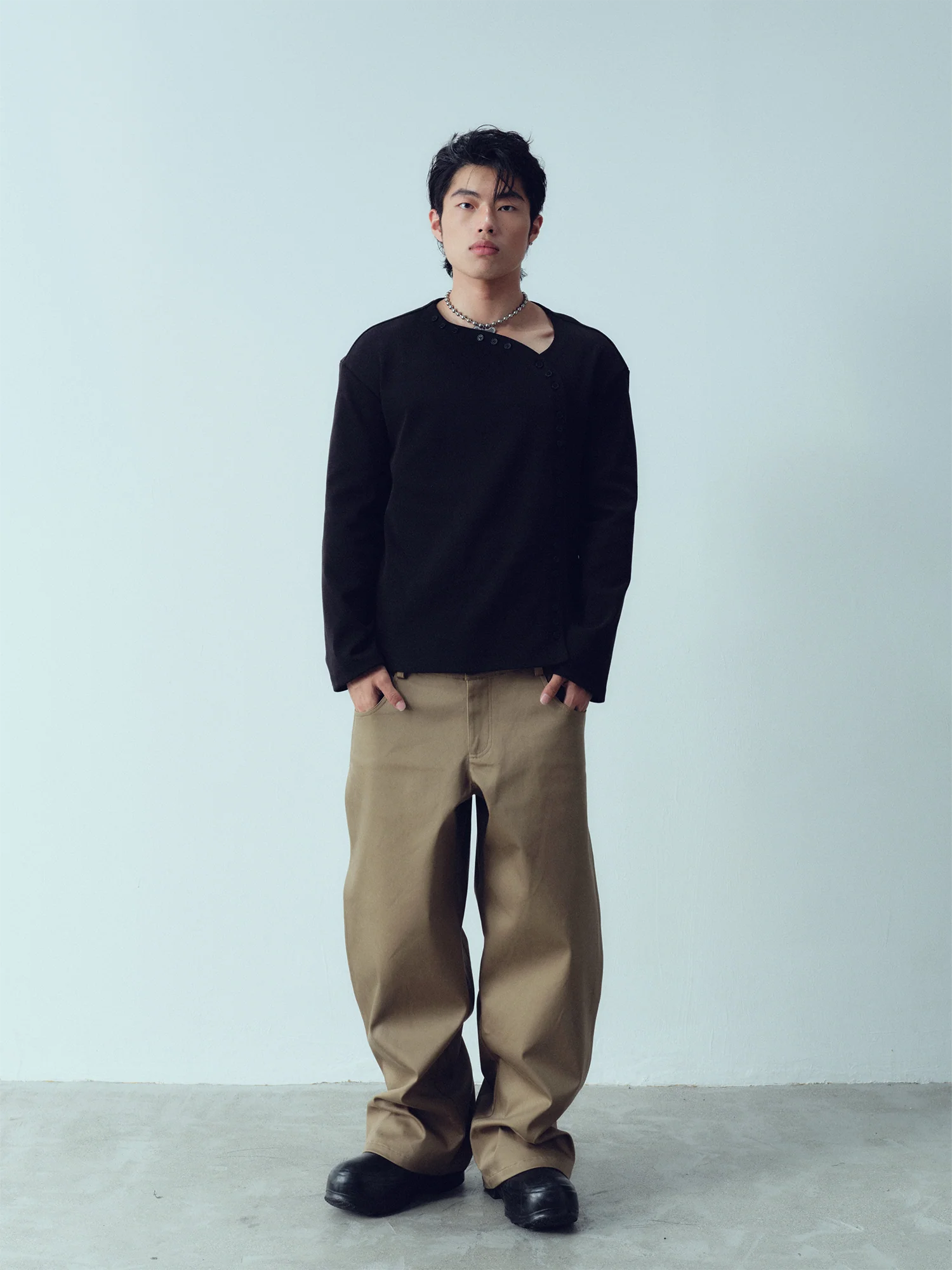 KADAKADA Buttoned Curved Placket Ribbed Knit Top