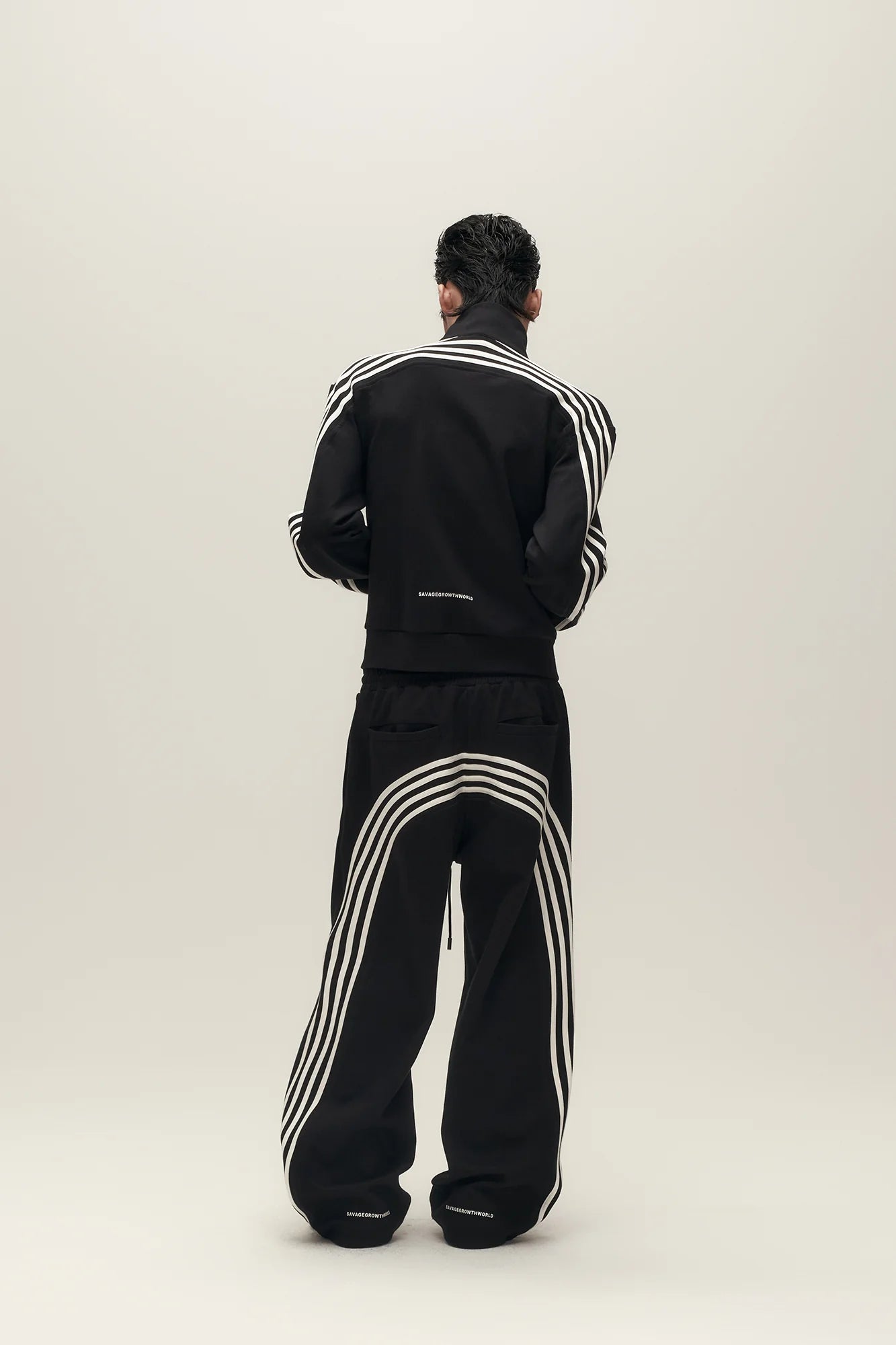 SAVAGEGROWTHWORLD Back-Arc Striped Graphic Track Pants