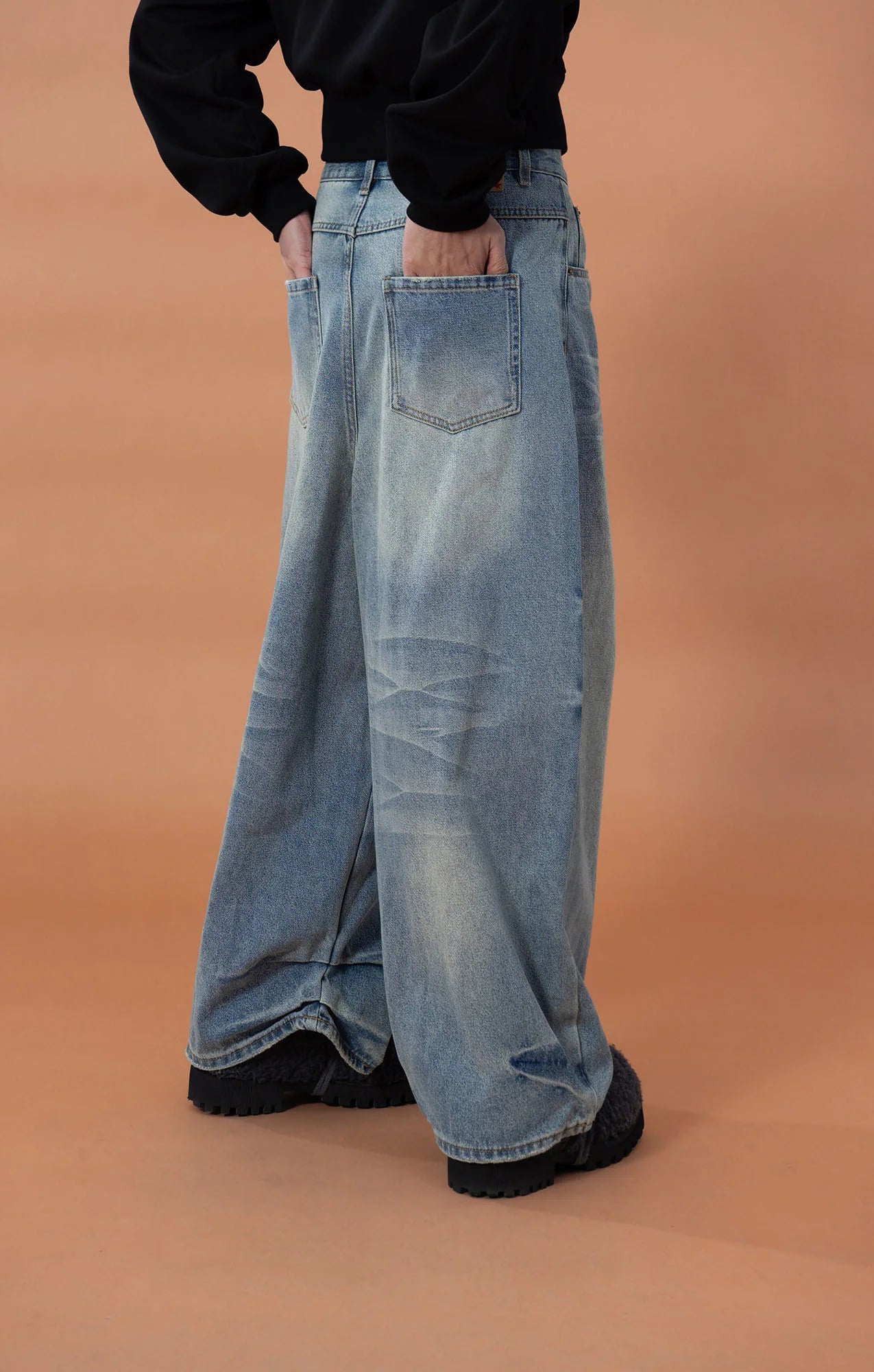 CLP Whiskering Washed Oversized Curved-Leg Jeans