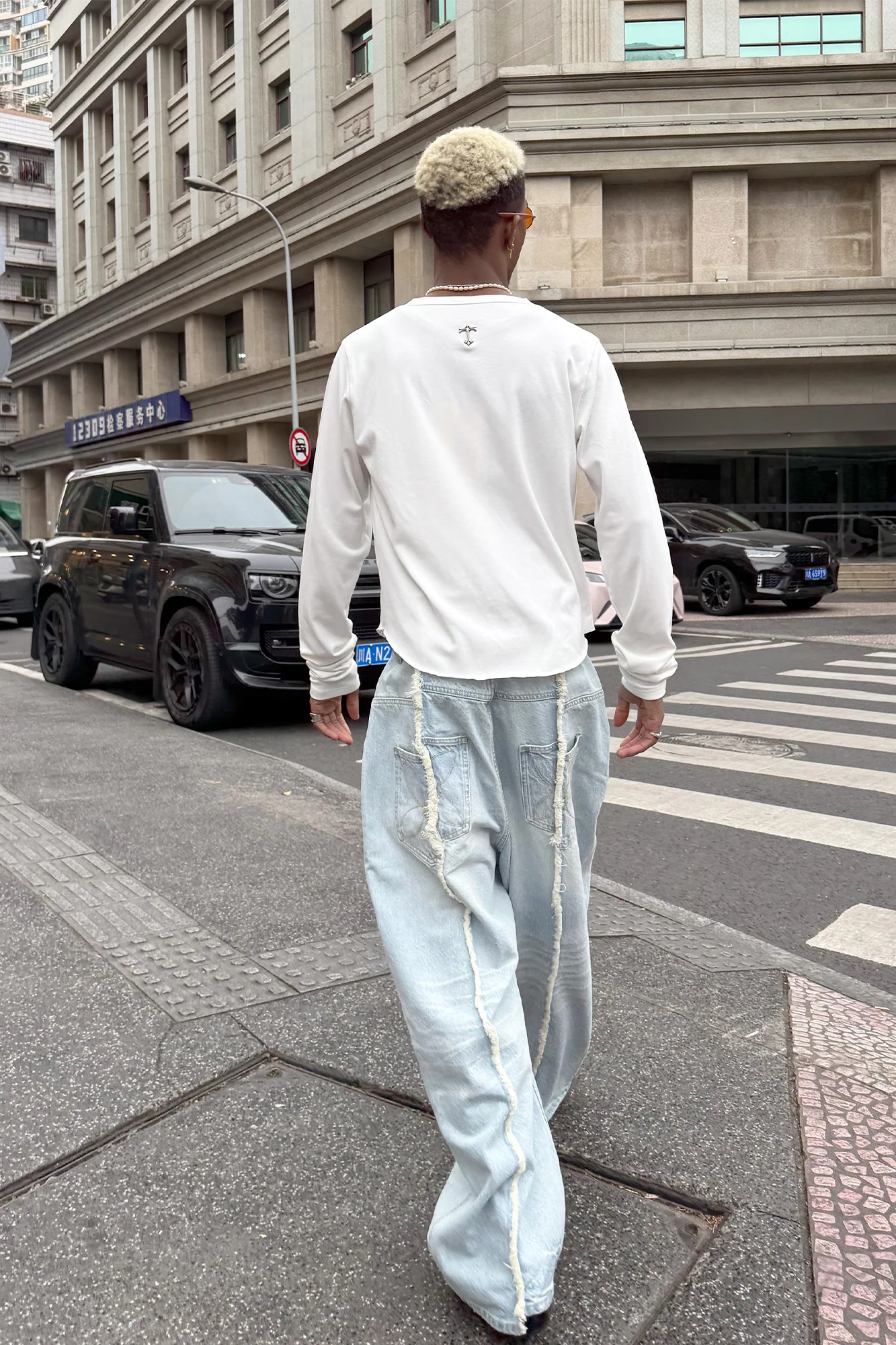 STEEPC Washed Frayed Seam Baggy Jeans