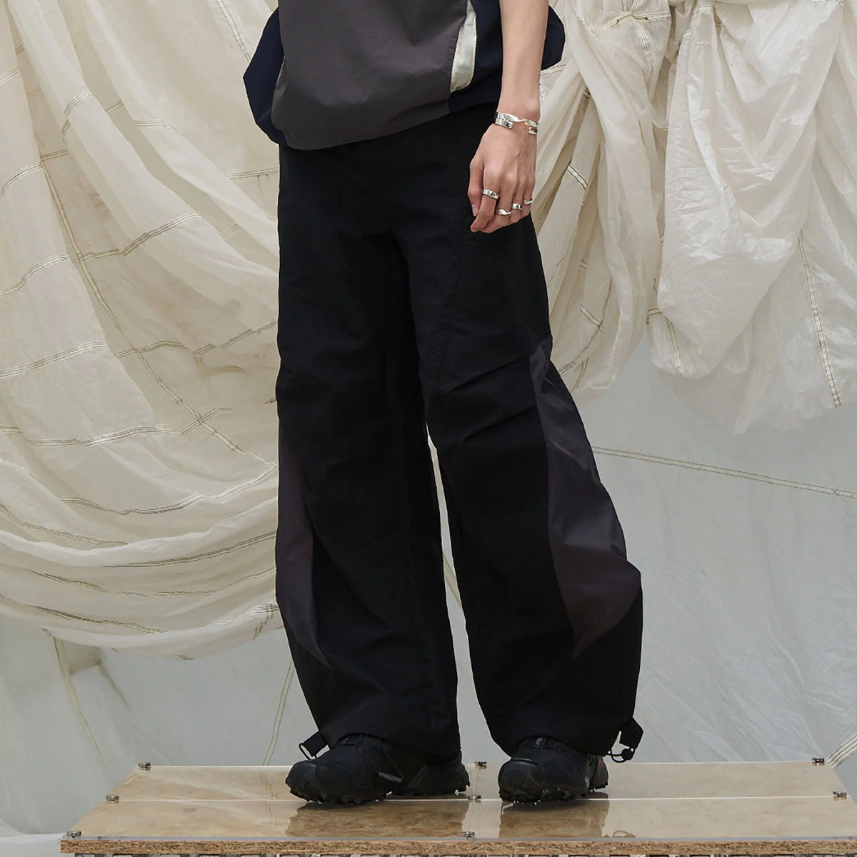 RELABEL Deconstructed Paneled Drawstring Parachute Pants
