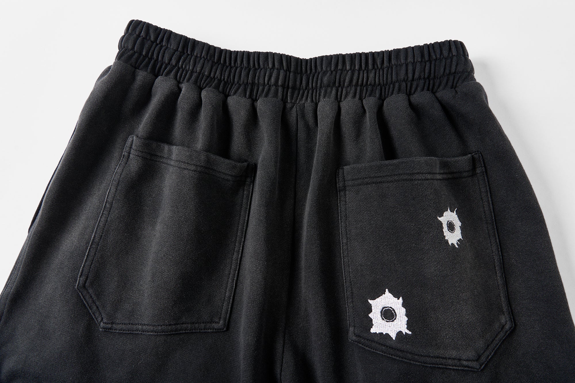 SAVAGEGROWTHWORLD Bullet Graphic Washed Wide-Leg Sweatpants