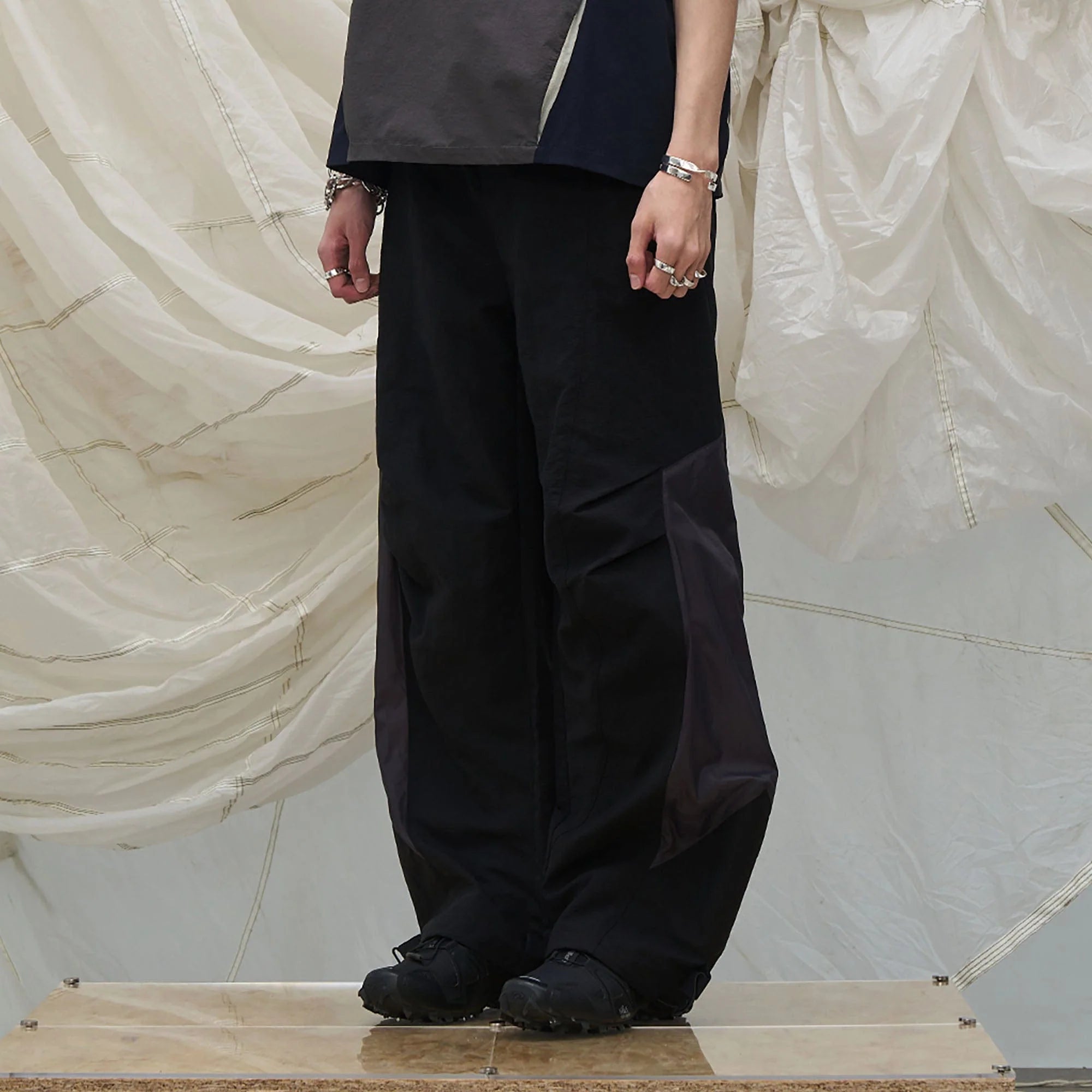 RELABEL Deconstructed Paneled Drawstring Parachute Pants