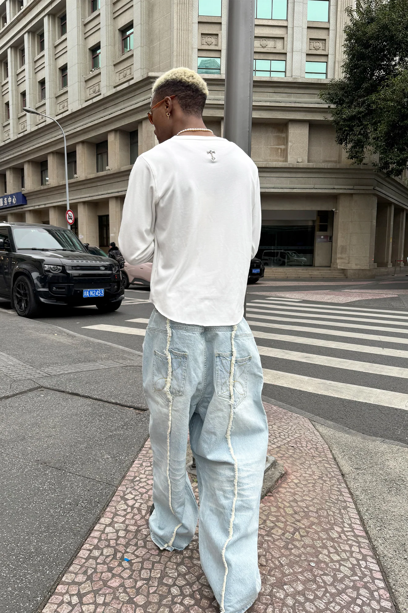 STEEPC Washed Frayed Seam Baggy Jeans