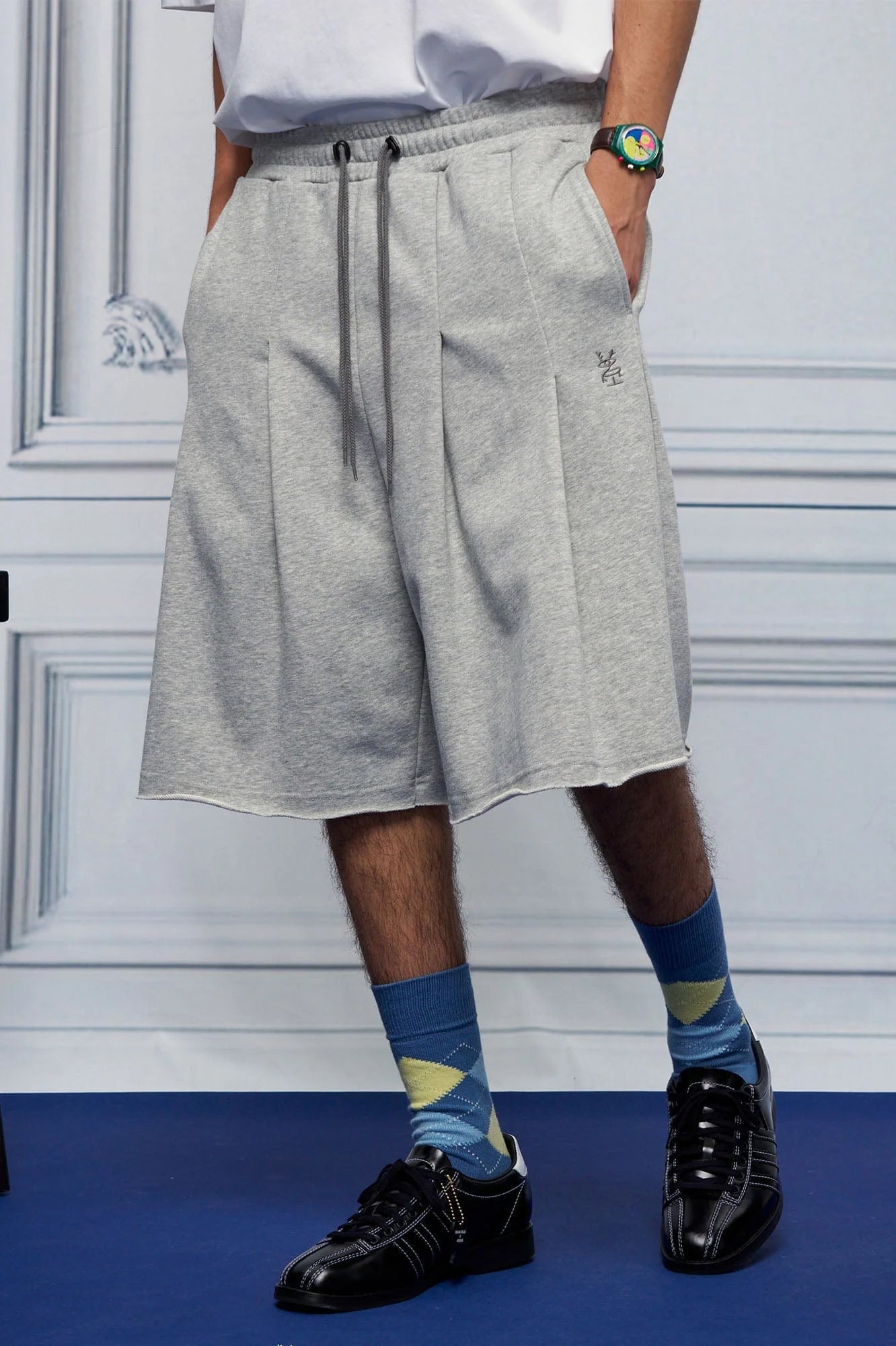 UNLIMITED MOTE Multi-Pleated Drawstring Raw-Hem Shorts