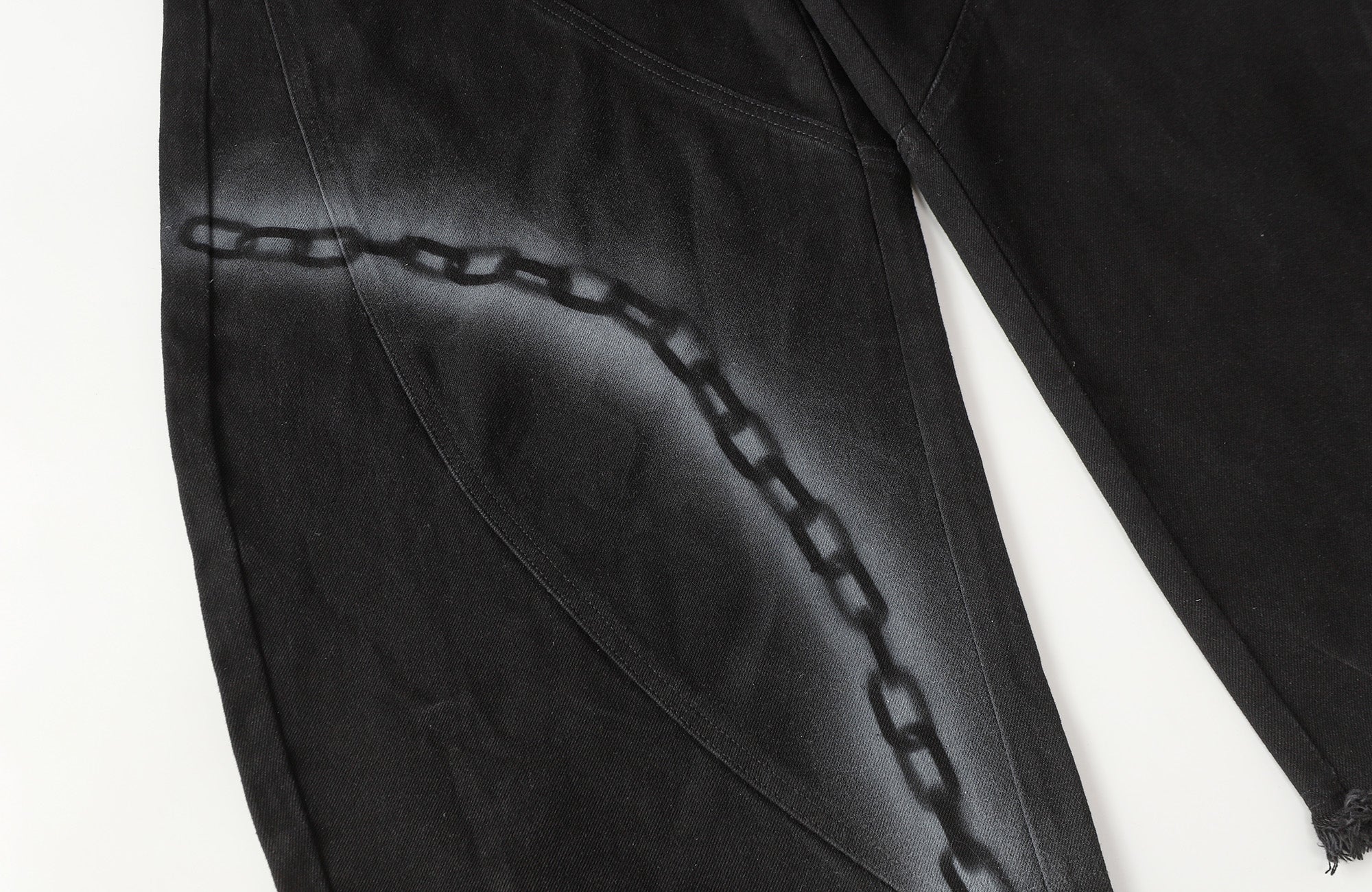 CLP Chain Graphic Frayed Curved-Leg Jeans