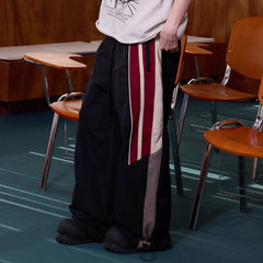 ERROR CODE ROBOT Diagonal Stripe Suede Track Pants