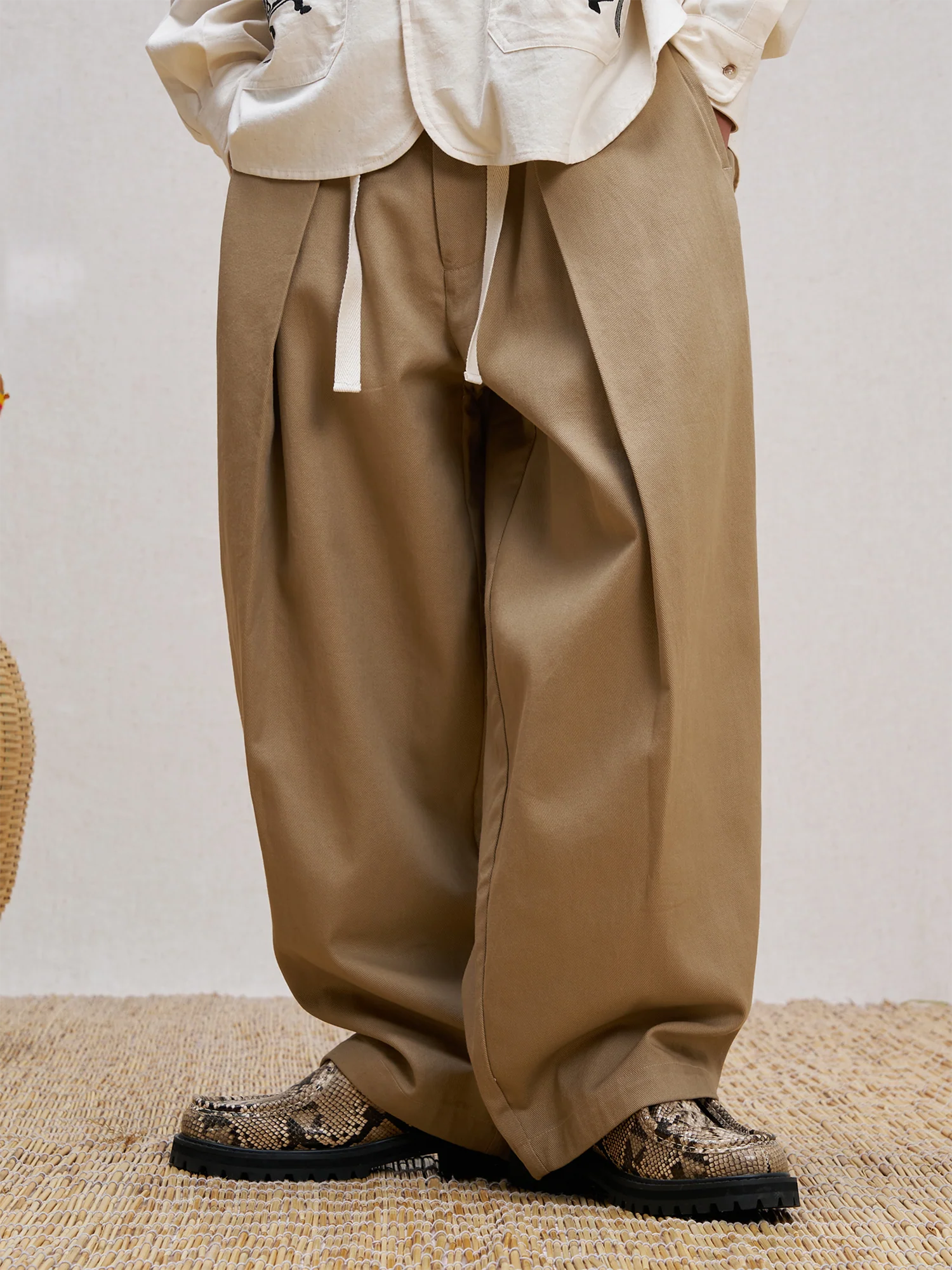 UNLIMITED MOTE Pleated Herringbone Wide-Leg Trousers