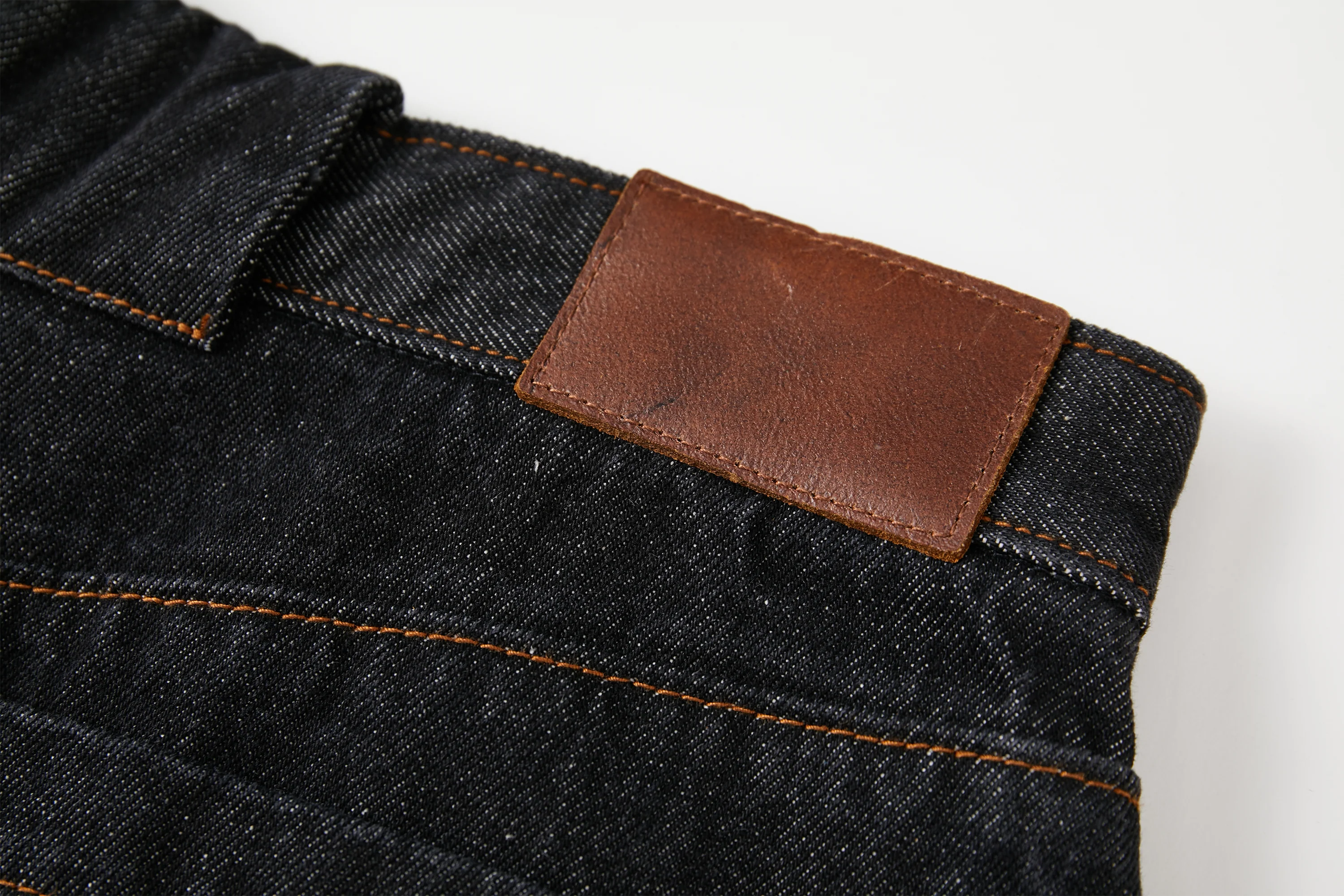 OPICLOTH Curved Panel Oversized Raw Jeans