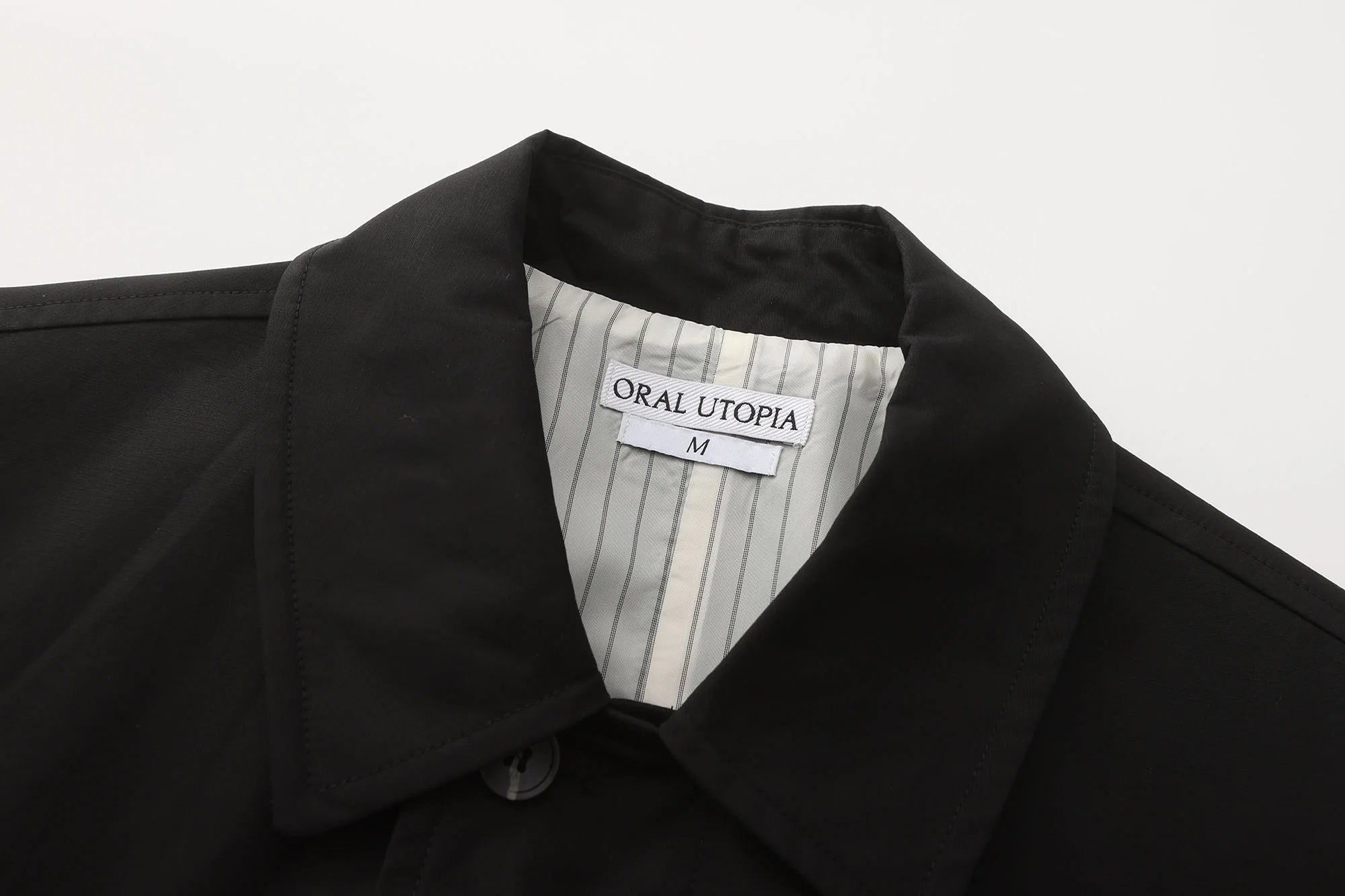 ORAL UTOPIA Faux Layered Hem Multi-Pocket Coat