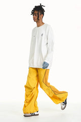 RELABEL Zig-Zag Spliced Pleated Parachute Pants