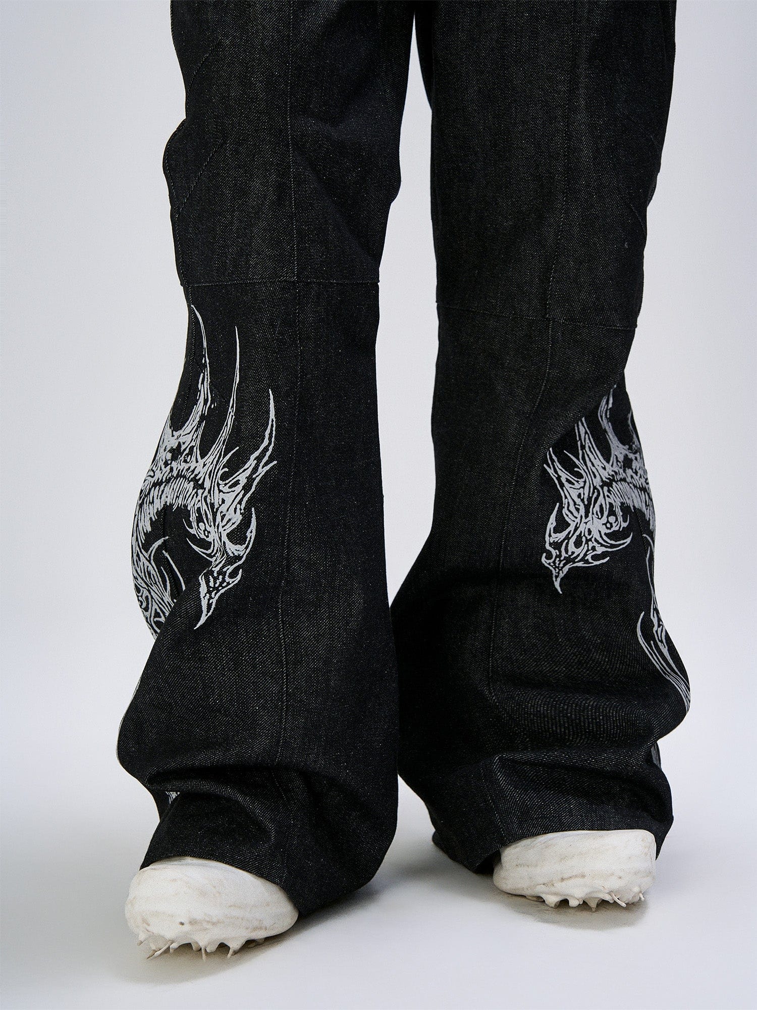 FLYERRER Abstract Graphic Flared Raw Jeans