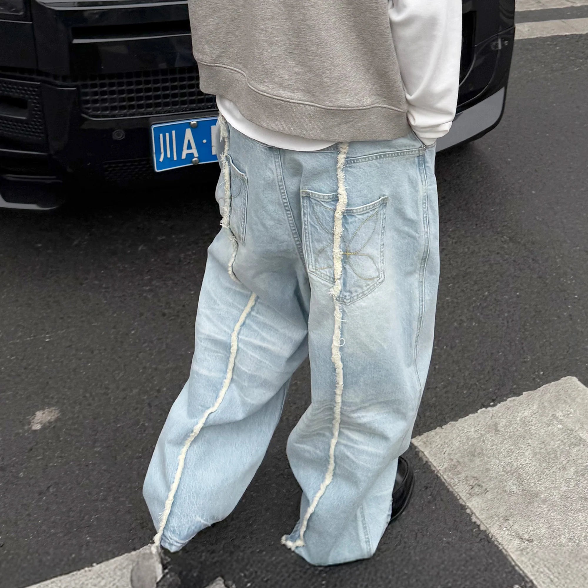 STEEPC Washed Frayed Seam Baggy Jeans