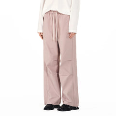 OVERLAPS Paneled Pleated-Knee Drawstring Wide-Leg Pants