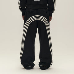 SAVAGEGROWTHWORLD Back-Arc Striped Graphic Track Pants