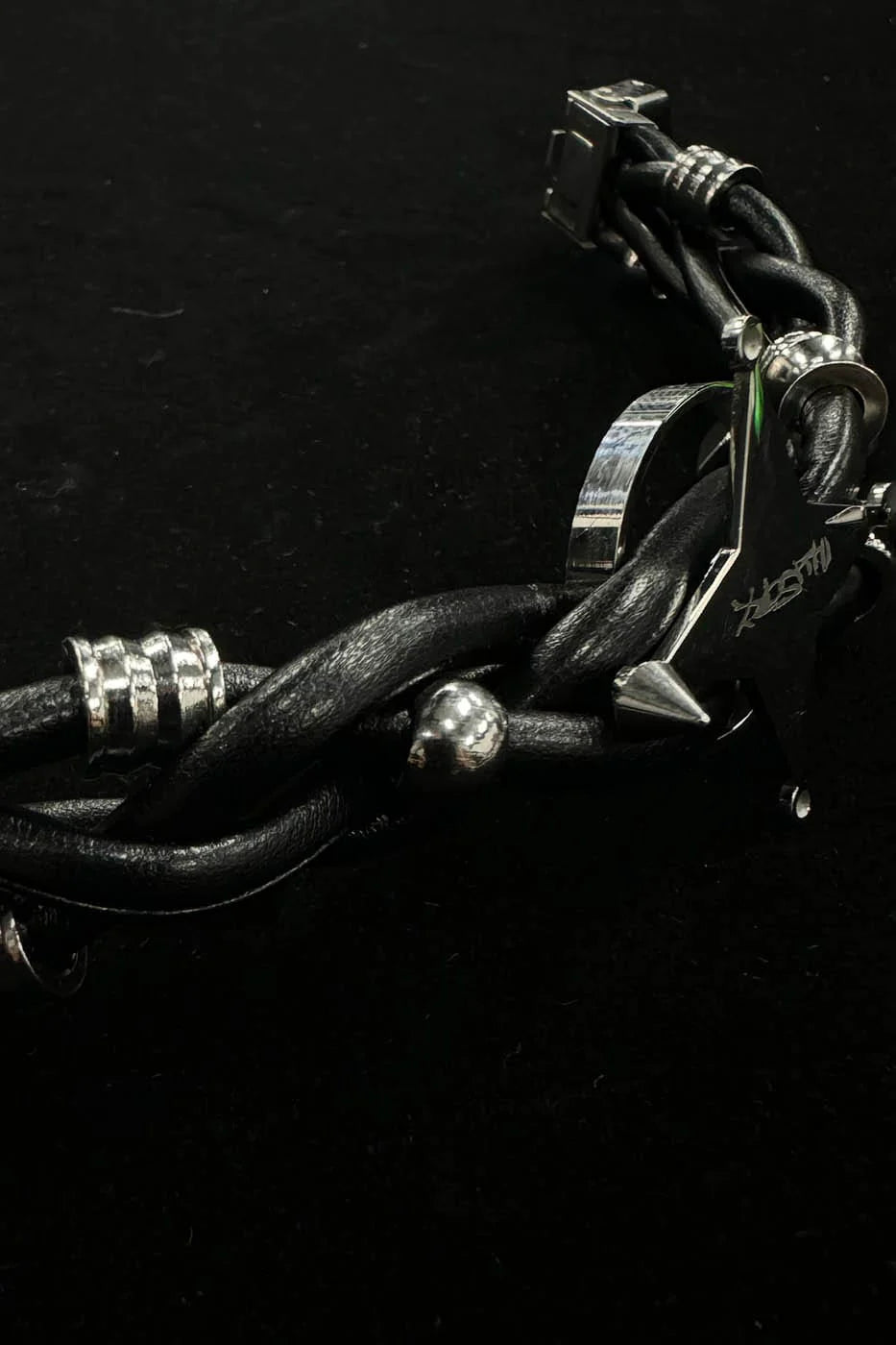 ILLUSORY Four-Point Star Braided Faux Leather Bracelet