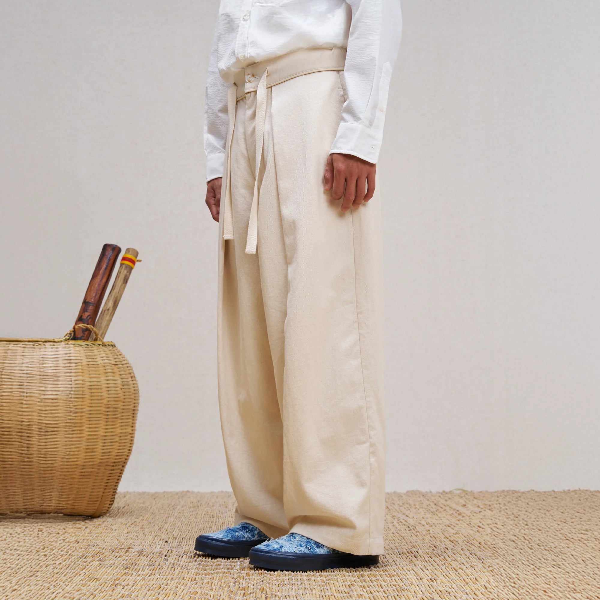 UNLIMITED MOTE Pleated Herringbone Wide-Leg Trousers
