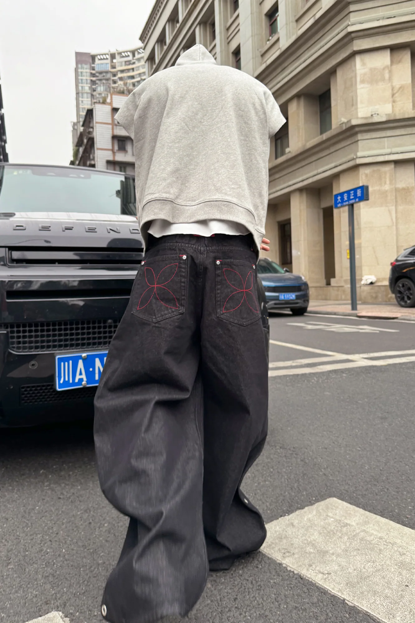 STEEPC Grommet Snap-Fly Flared Raw Jeans