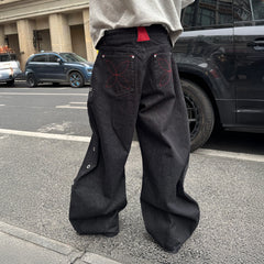 STEEPC Grommet Snap-Fly Flared Raw Jeans
