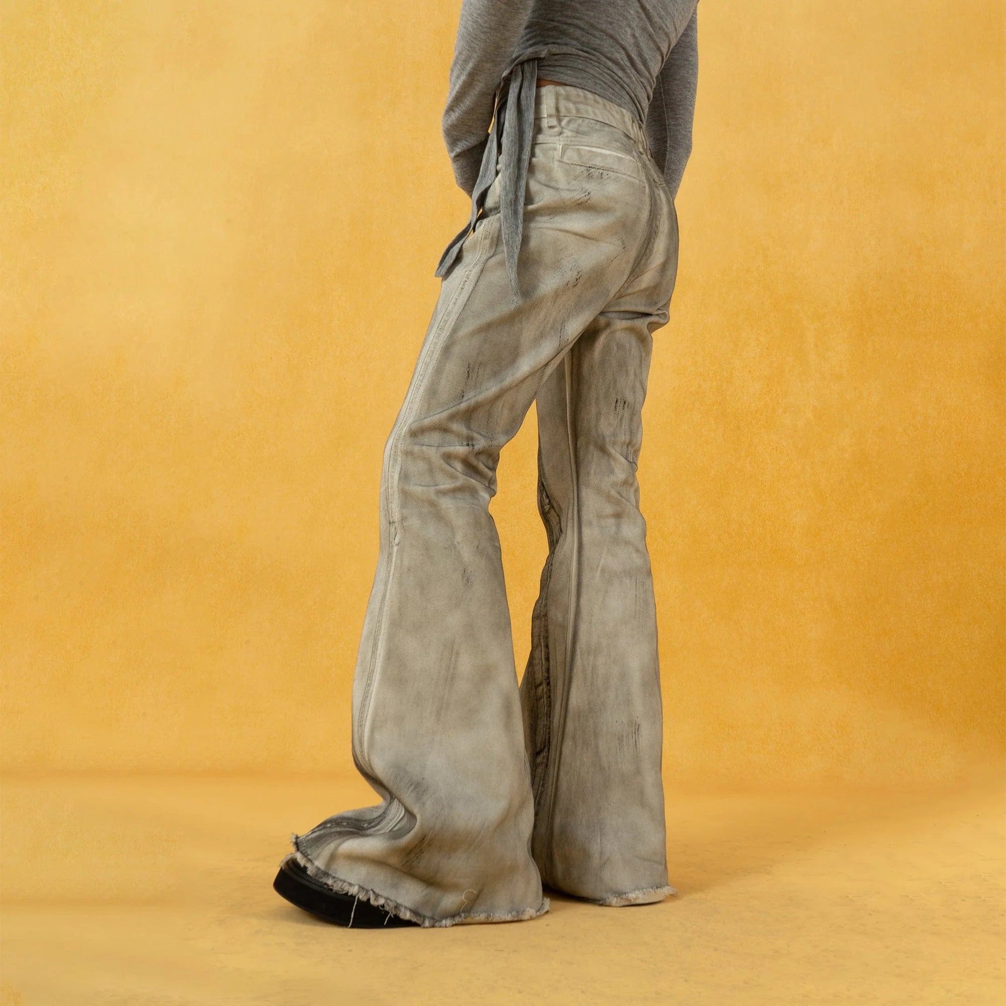CLP Spliced Distressed Raw Edge Flared Jeans
