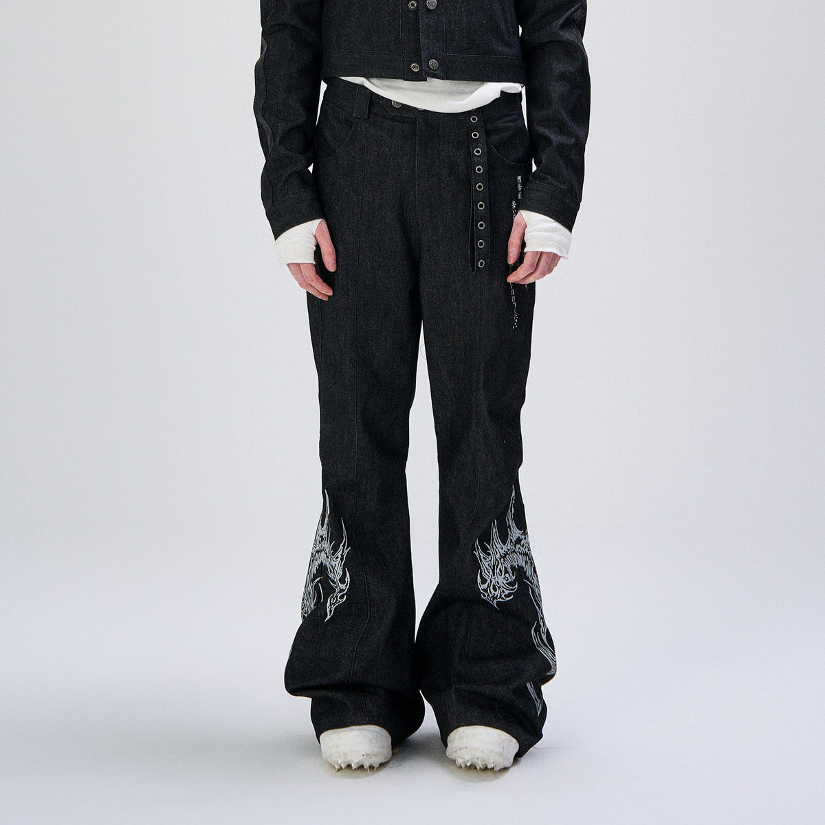 FLYERRER Abstract Graphic Flared Raw Jeans