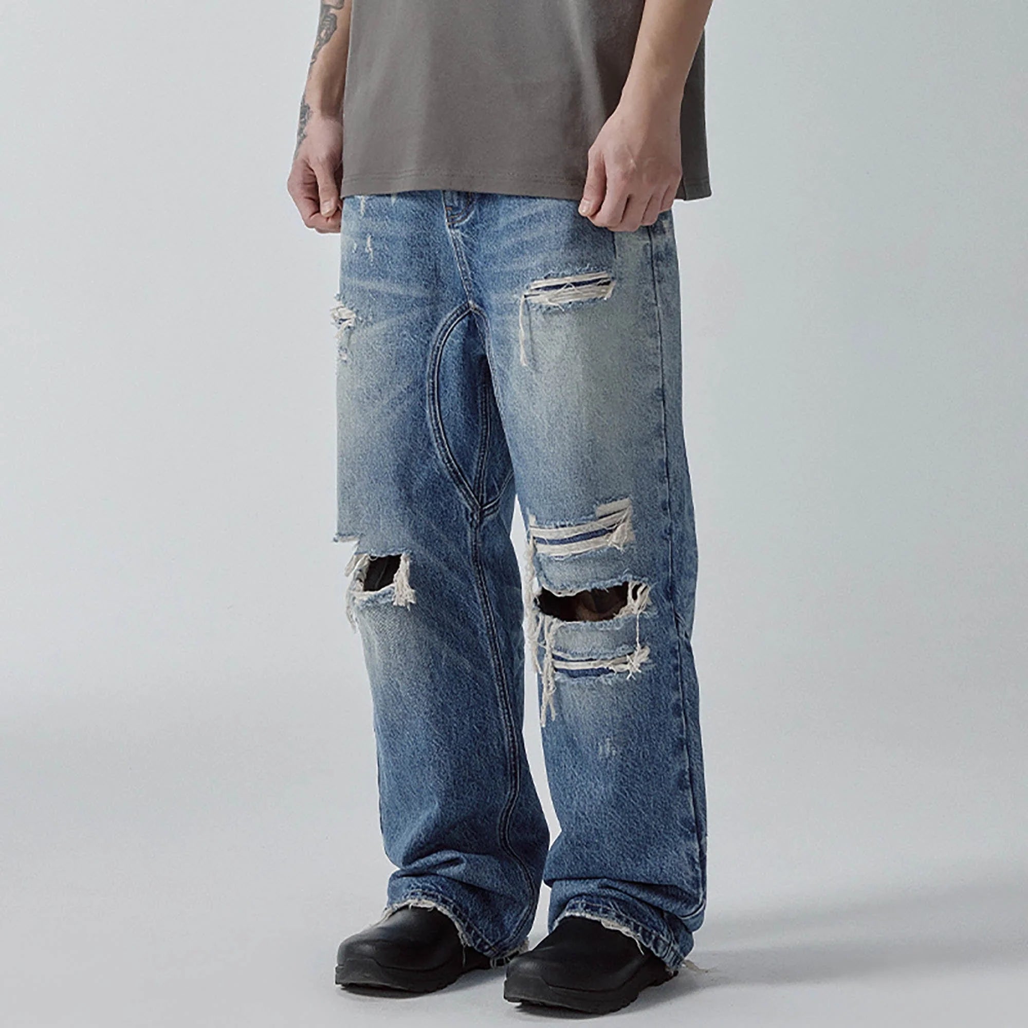 F2CE Ripped Curved Spliced Jeans