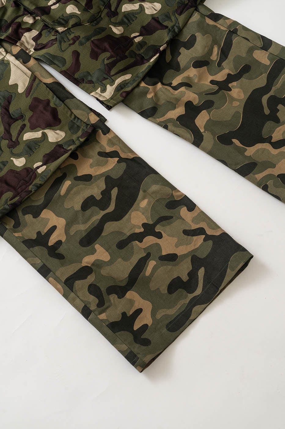 KADAKADA Dinosaur-Camo Embossed Multi-Pocket Skirt Pants