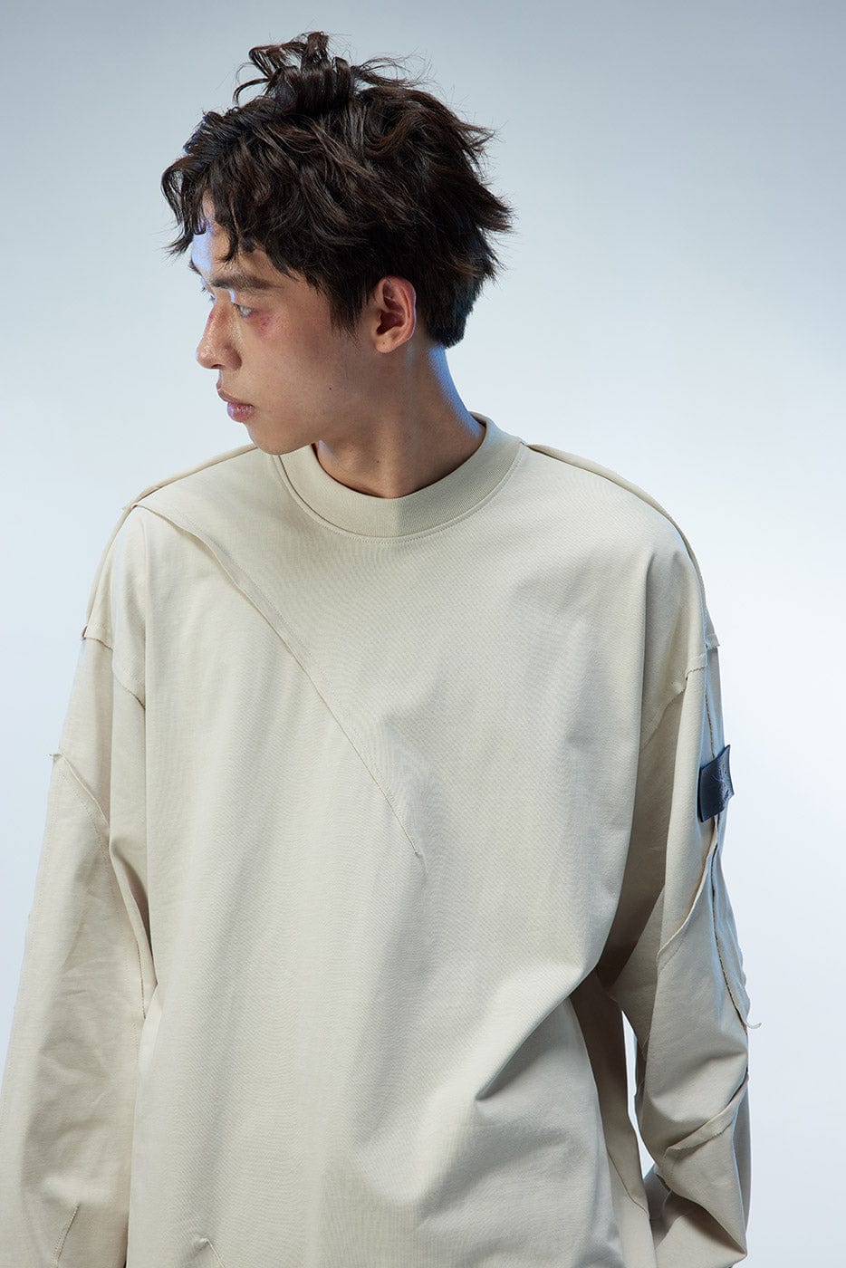 WHISTLEHUNTER Asymmetric Cut Logo Patched L/S Tee