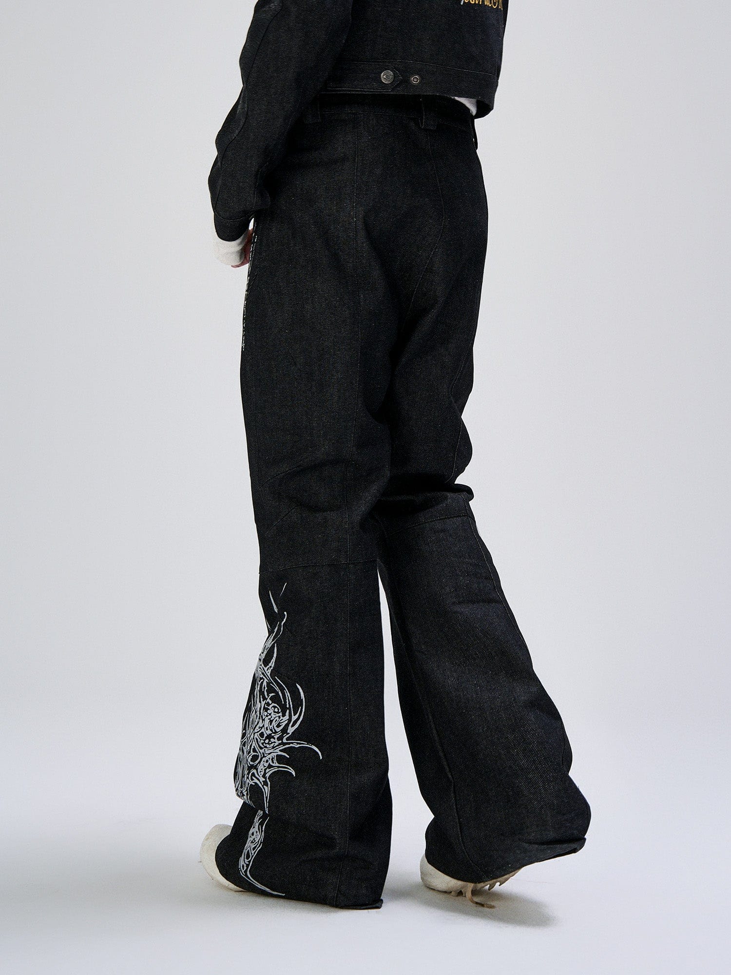 FLYERRER Abstract Graphic Flared Raw Jeans