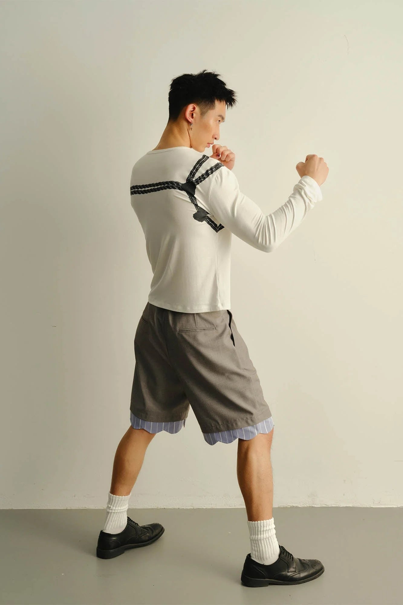 KADAKADA Scalloped Layered Hem Pleated Shorts
