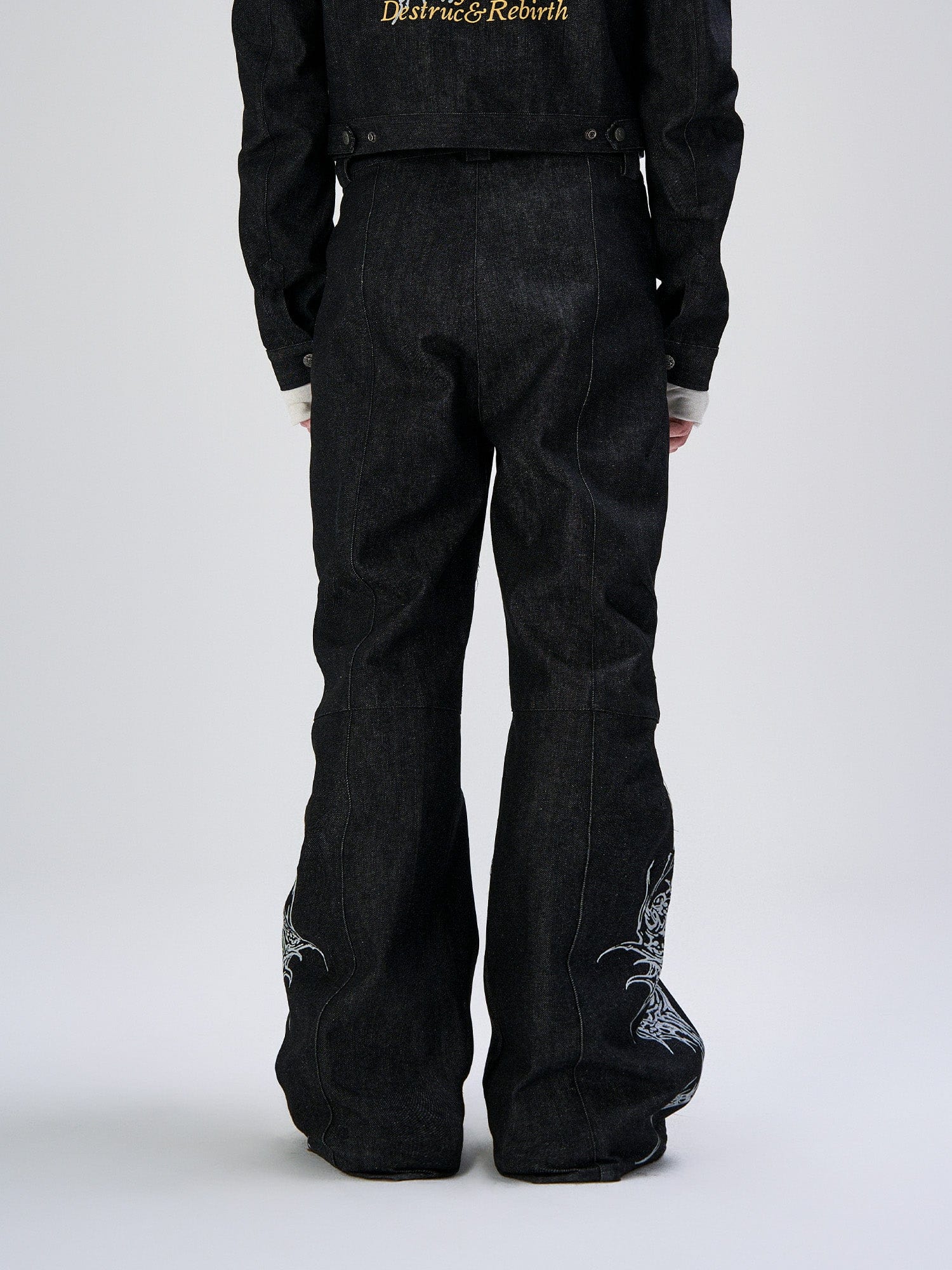 FLYERRER Abstract Graphic Flared Raw Jeans
