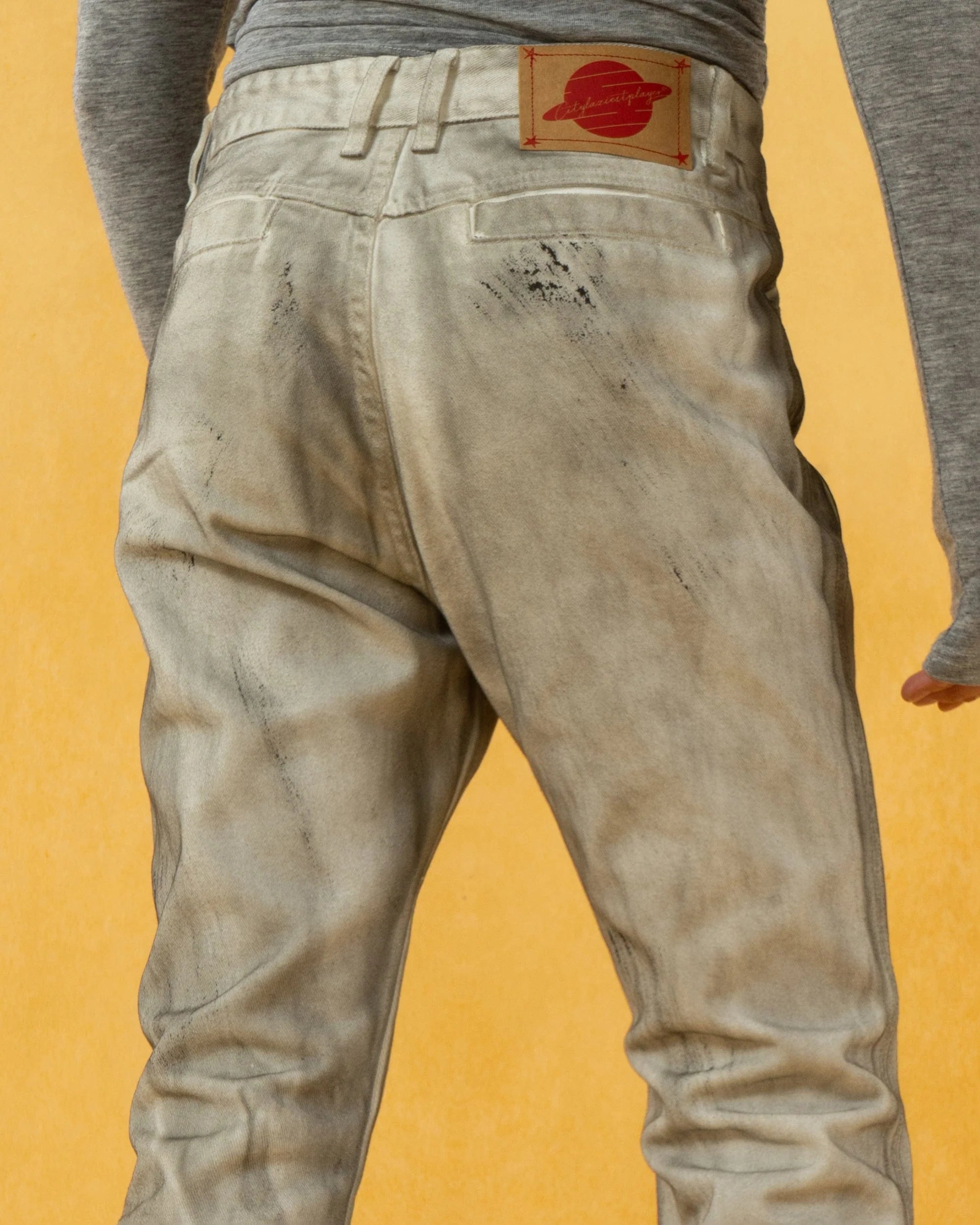 CLP Spliced Distressed Raw Edge Flared Jeans