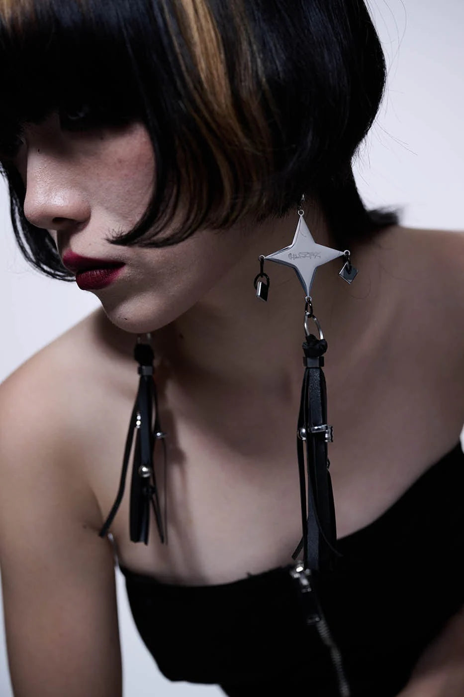 ILLUSORY Four-Pointed Star Tassel Earrings