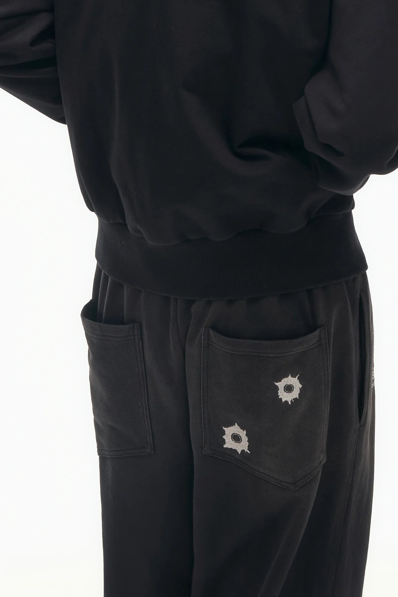 SAVAGEGROWTHWORLD Bullet Graphic Washed Wide-Leg Sweatpants