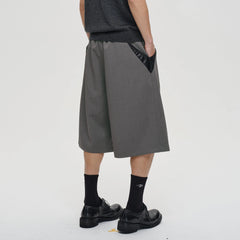 CATSSTAC Pleated Belted Wide-Leg Shorts