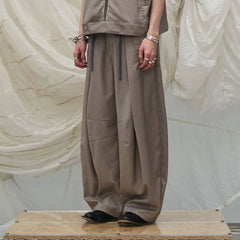 RELABEL Pleated Drawstring Curved Wide-Leg Trousers