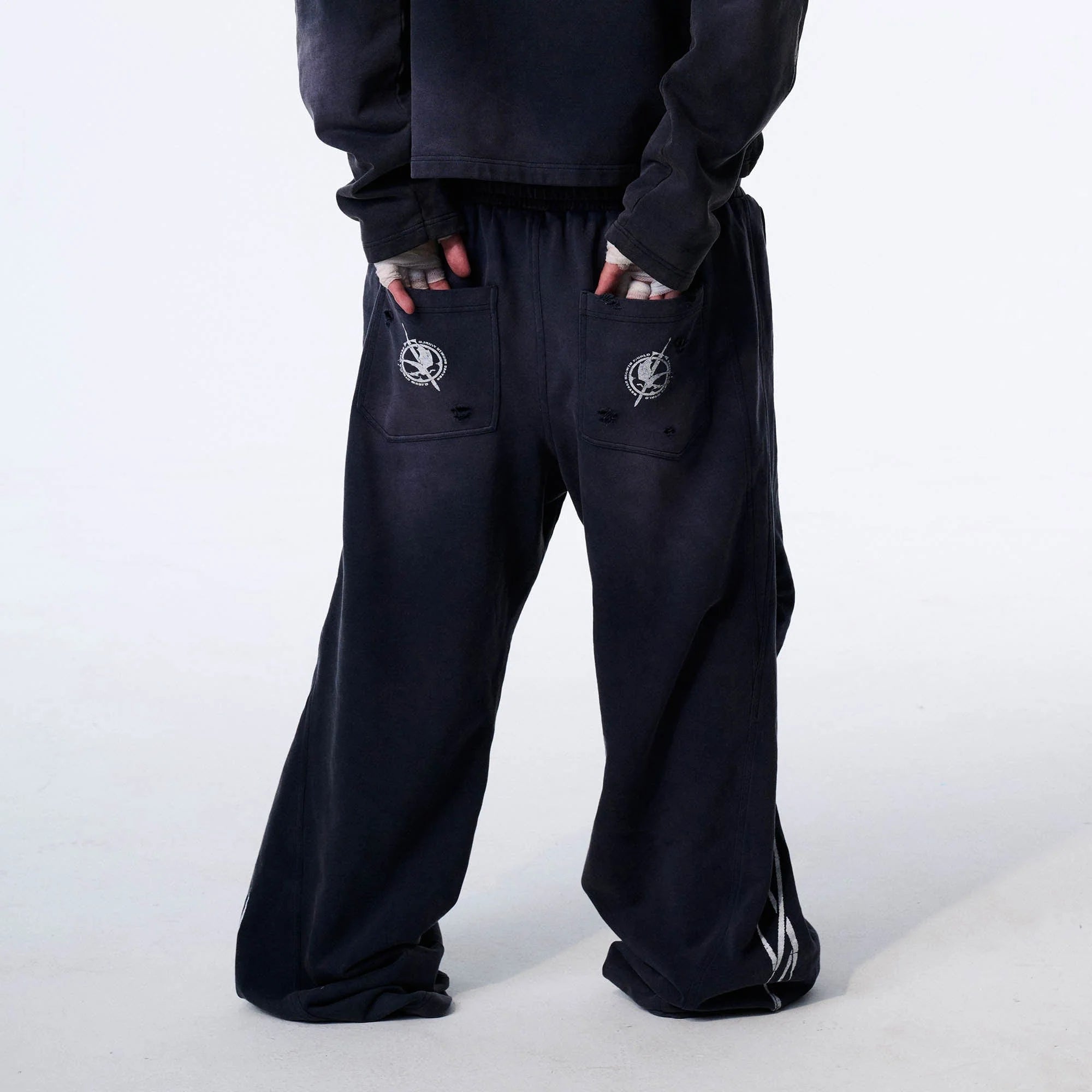 SAVAGEGROWTHWORLD Distressed Pleated Drawstring Baggy Pants
