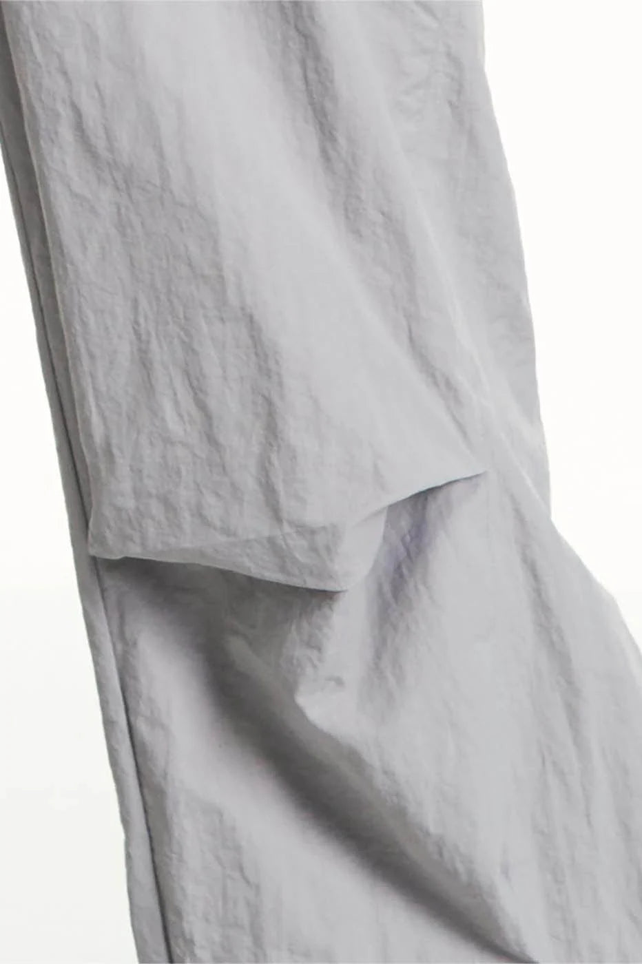 RELABEL Pleated Spliced Parachute Pants