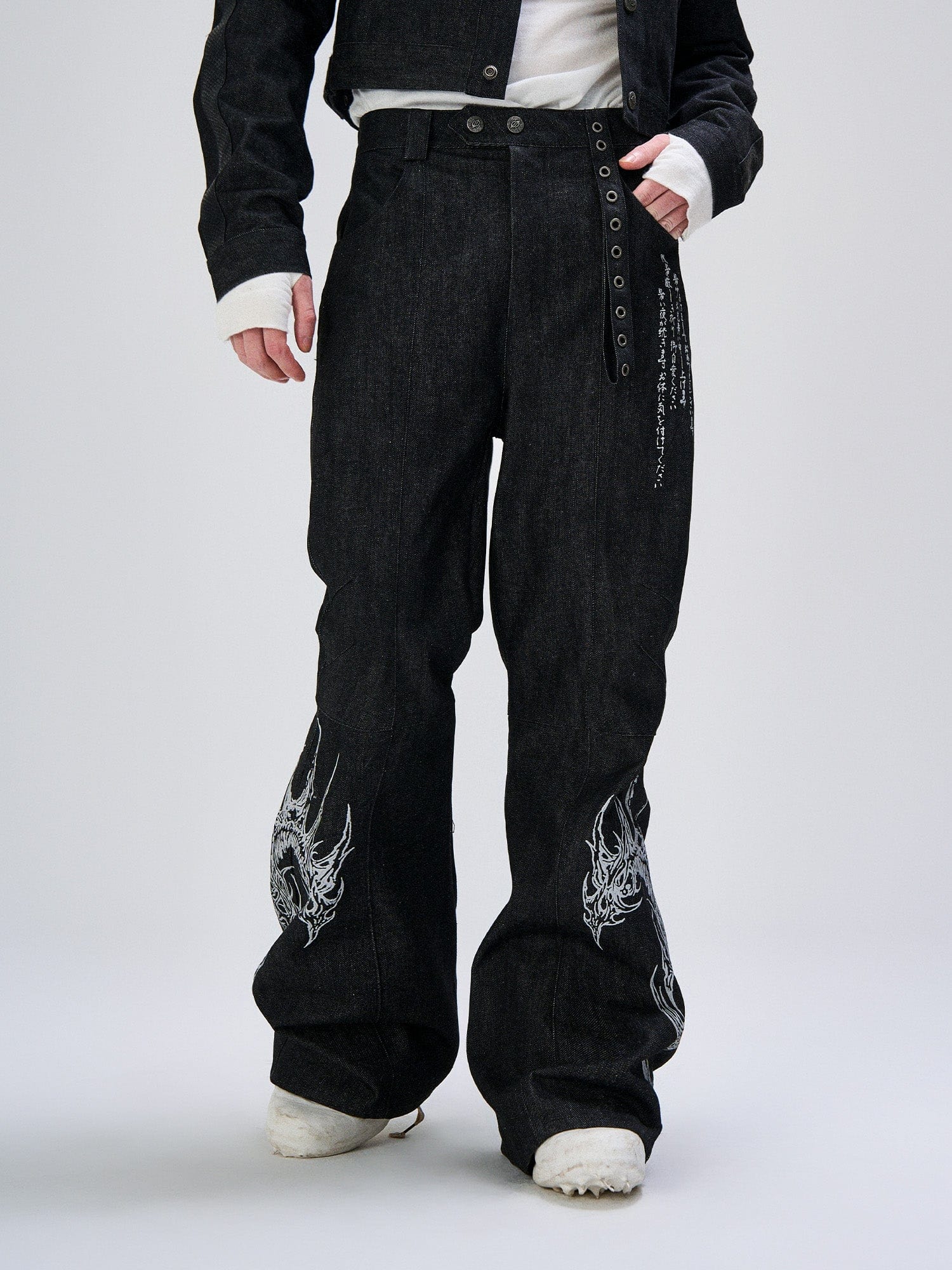 FLYERRER Abstract Graphic Flared Raw Jeans