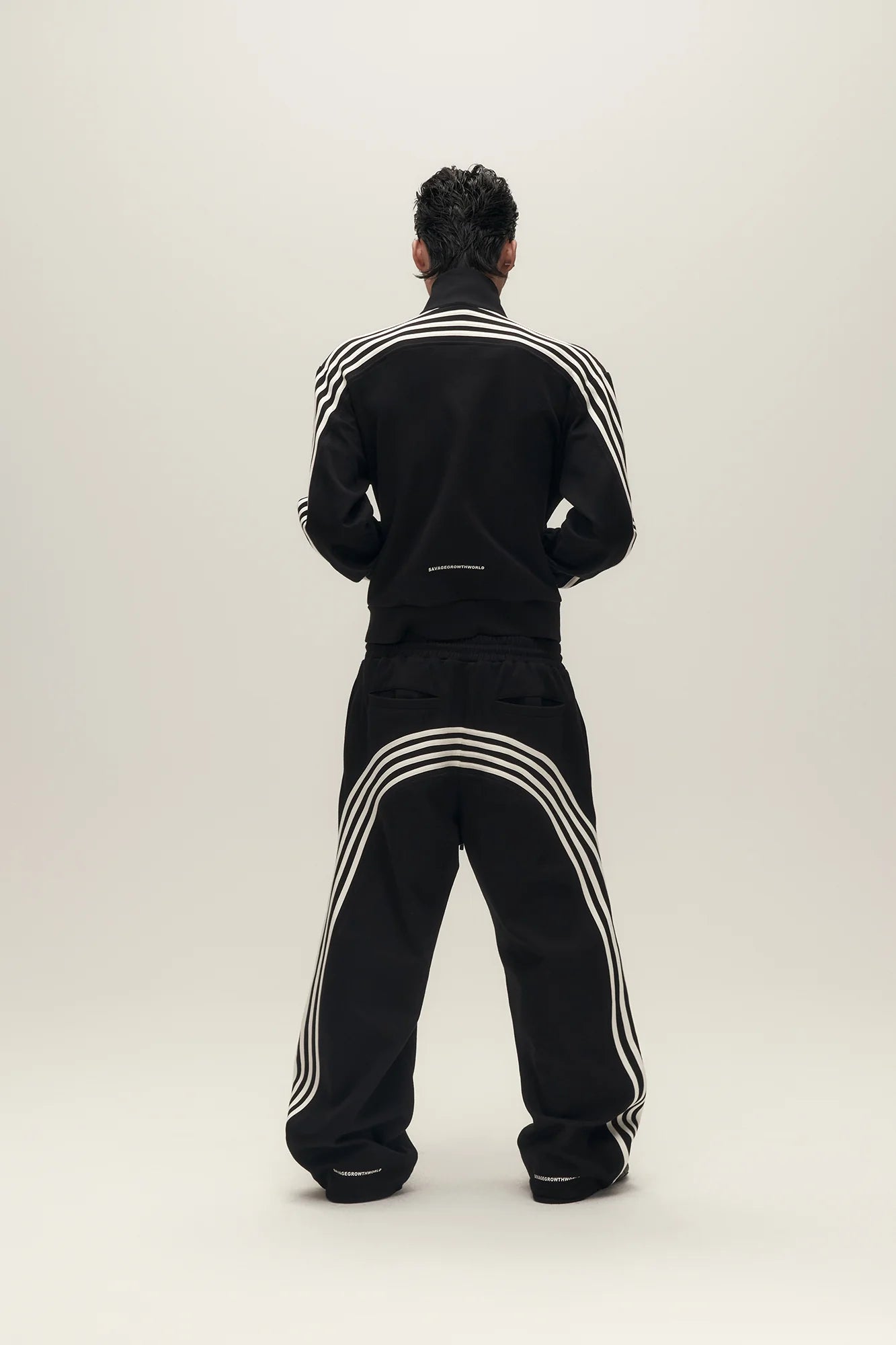 SAVAGEGROWTHWORLD Back-Arc Striped Graphic Track Pants